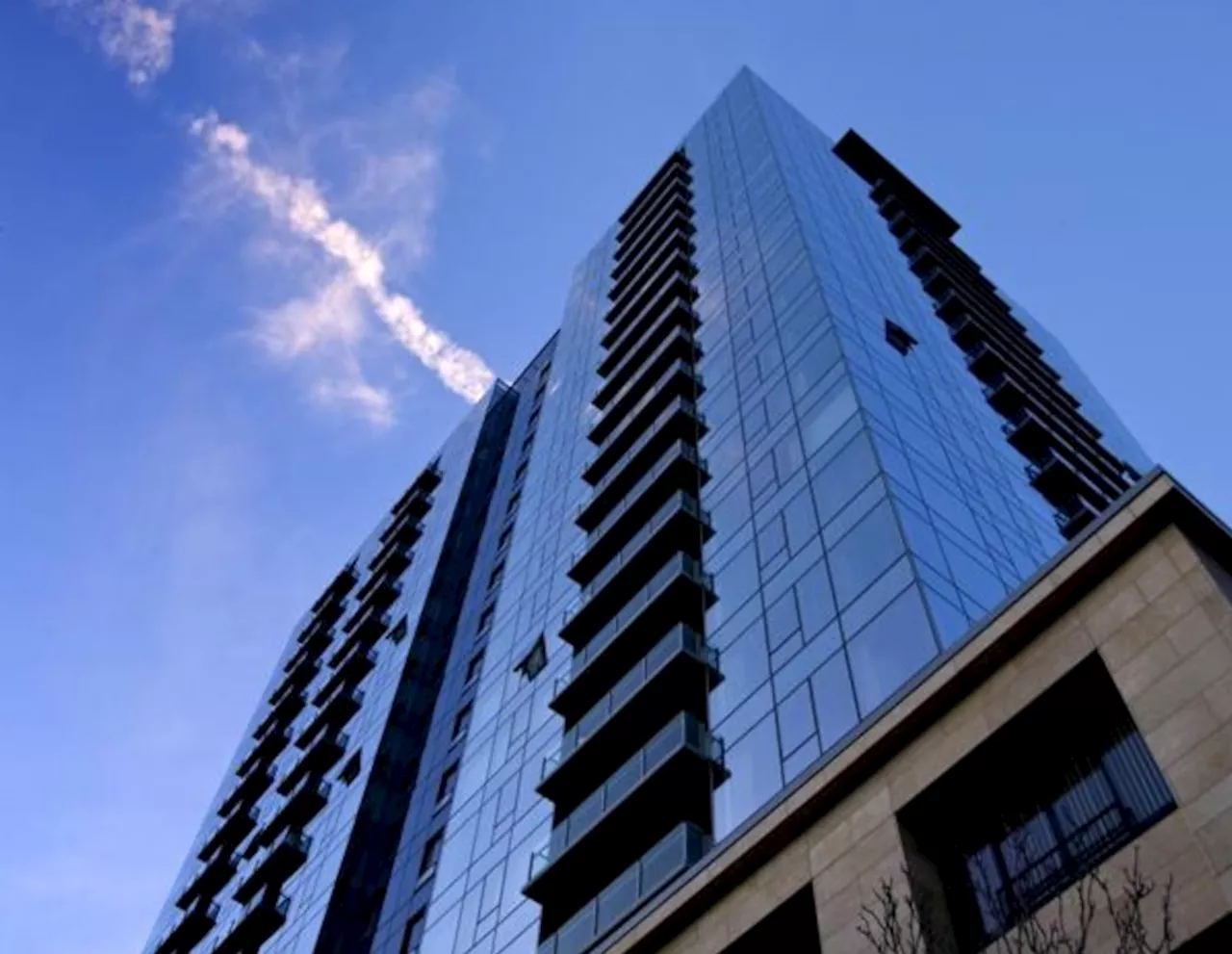 Someone has been throwing canned food off a high-rise for weeks, endangering those below