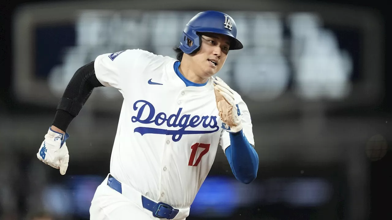 Ohtani hits 2-run homer and scores go-ahead run on his special day in LA as Dodgers beat Reds 7-3