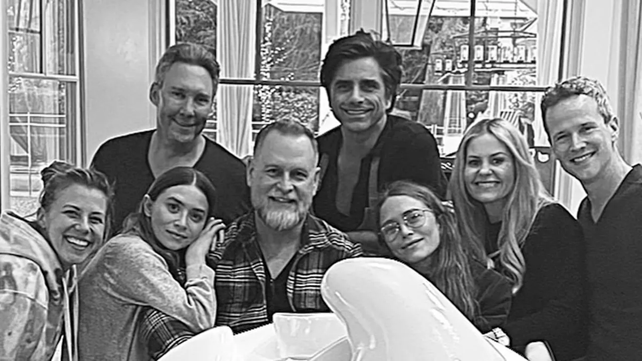 John Stamos shares rare photo with BOTH Mary-Kate and Ashley Olsen alongside the Full House cast...