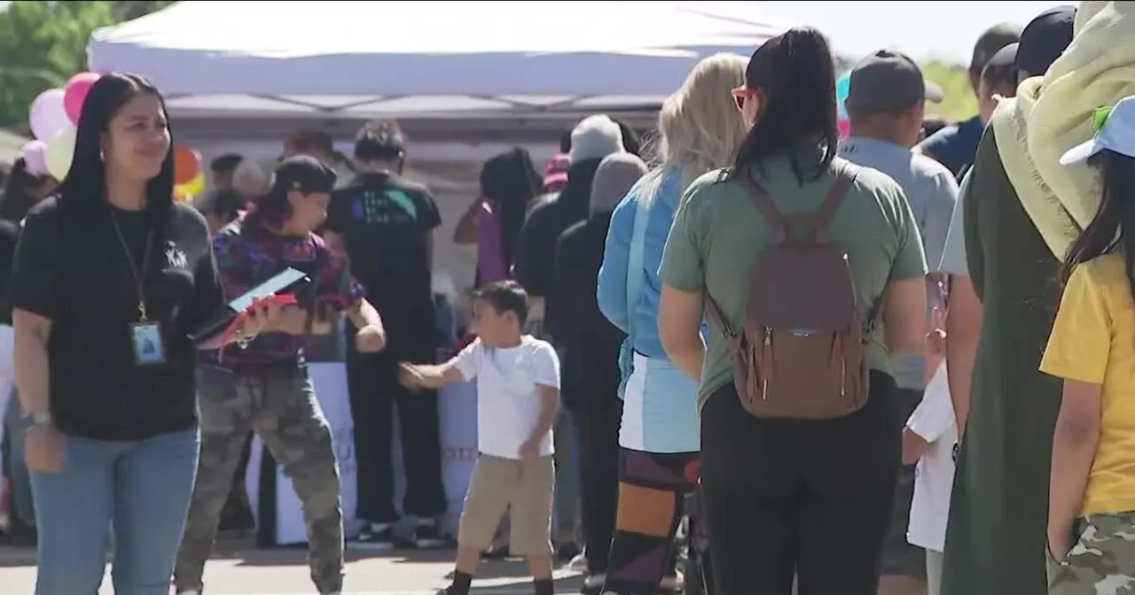 Denver educators distribute donations to hundreds of immigrant students and families