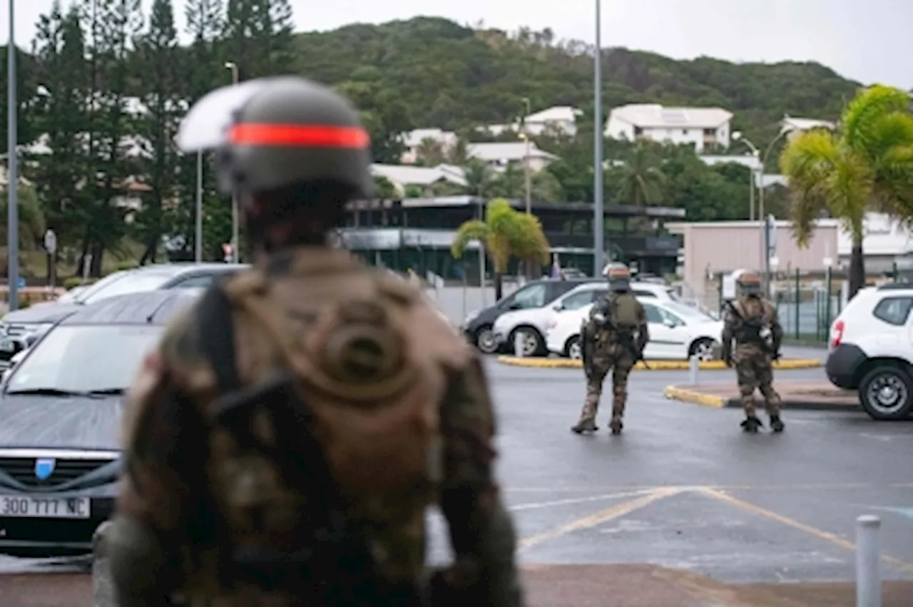 New Caledonia ‘under siege’ as French troops bid to restore order