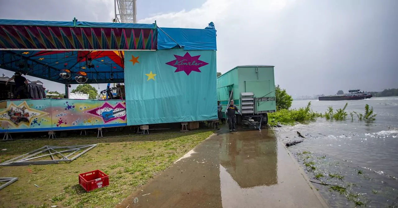 Steigende Pegel am Rhein: Kirmes-Fahrgeschäfte müssen umziehen​