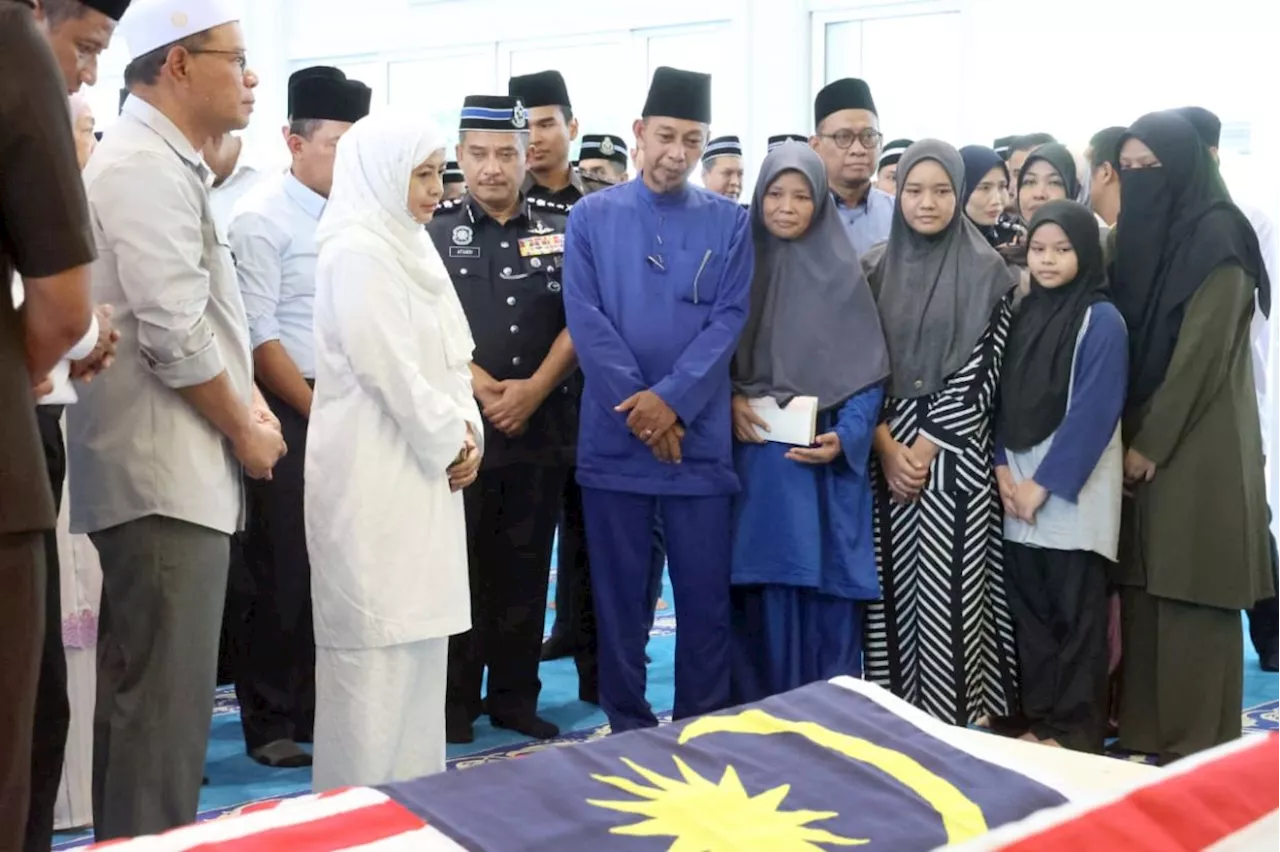 Ulu Tiram attack: Queen pays last respects to two slain policemen