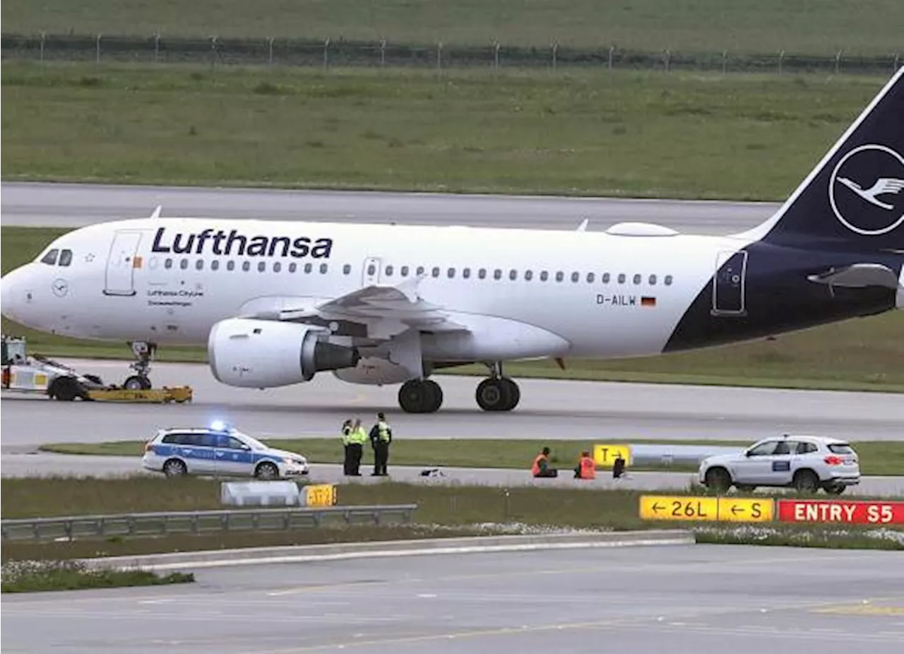 Protestan activistas climáticos en aeropuerto de Múnich