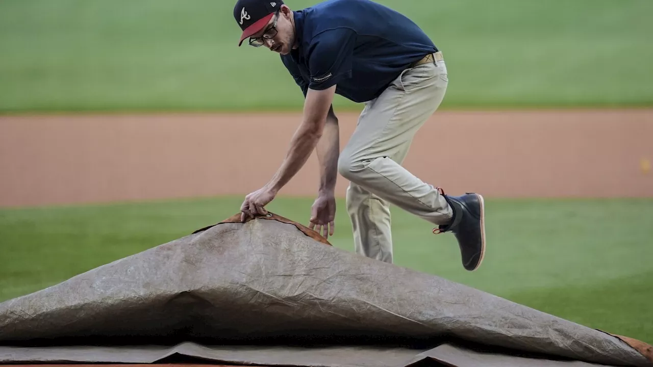 Padres-Braves game postponed by rain, lighting with doubleheader scheduled for Monday