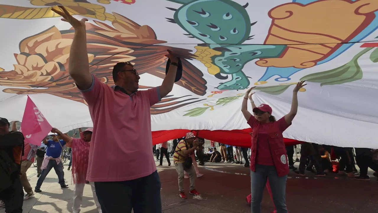 Tens of thousands protest against Mexico's president in the main square of Mexico City