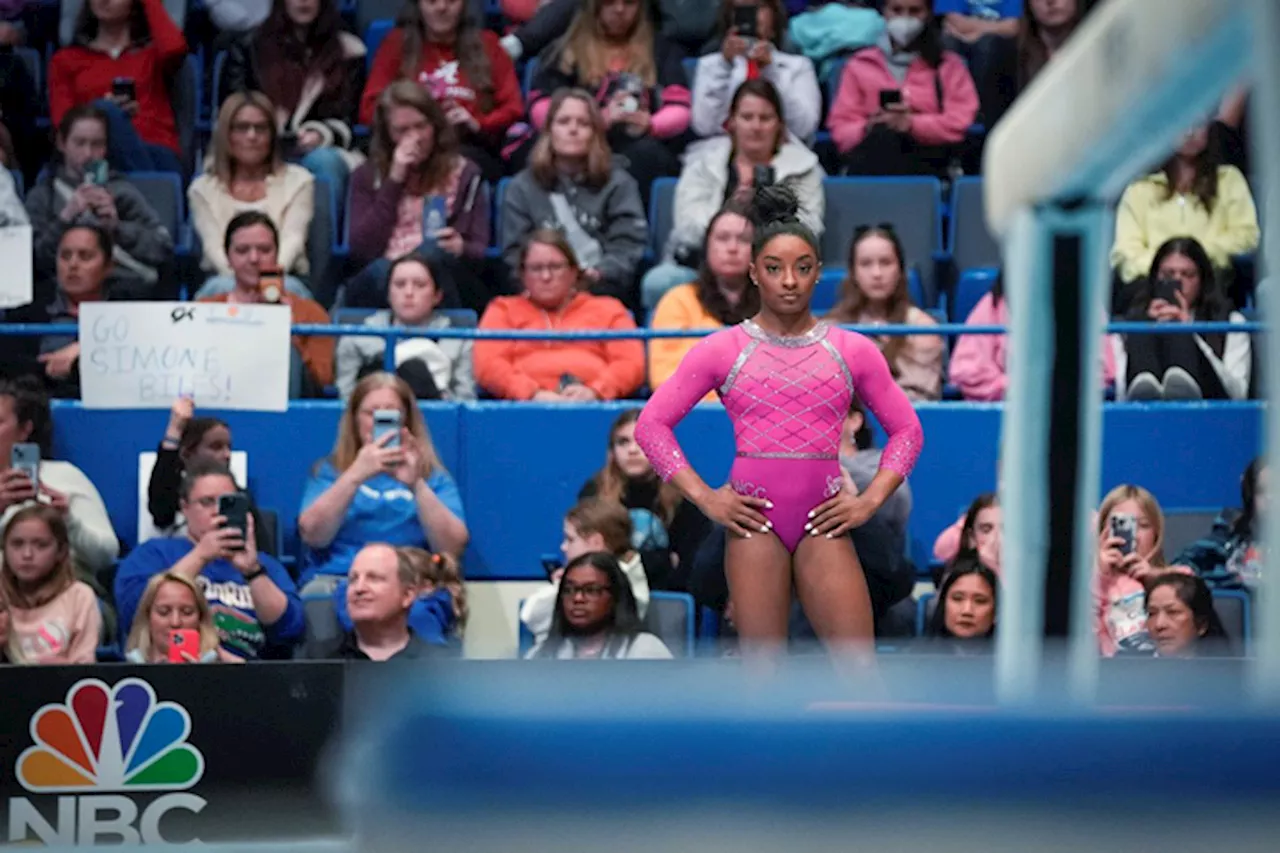 Biles shines in return as Douglas pulls out from US Classic