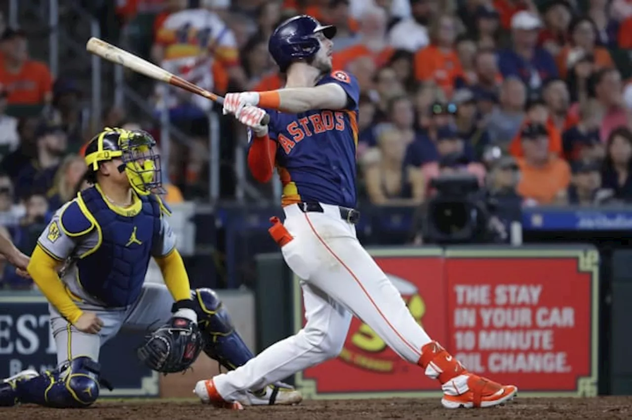 Tucker homers twice, ties for lead with 15 as Astros beat Brewers 9-4 for 9th win in 11 games