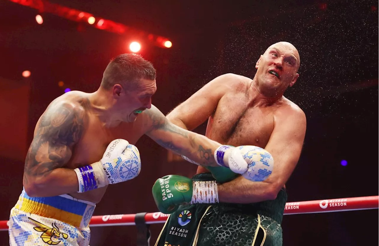 Oleksandr Usyk edges Tyson Fury to win undisputed heavyweight title