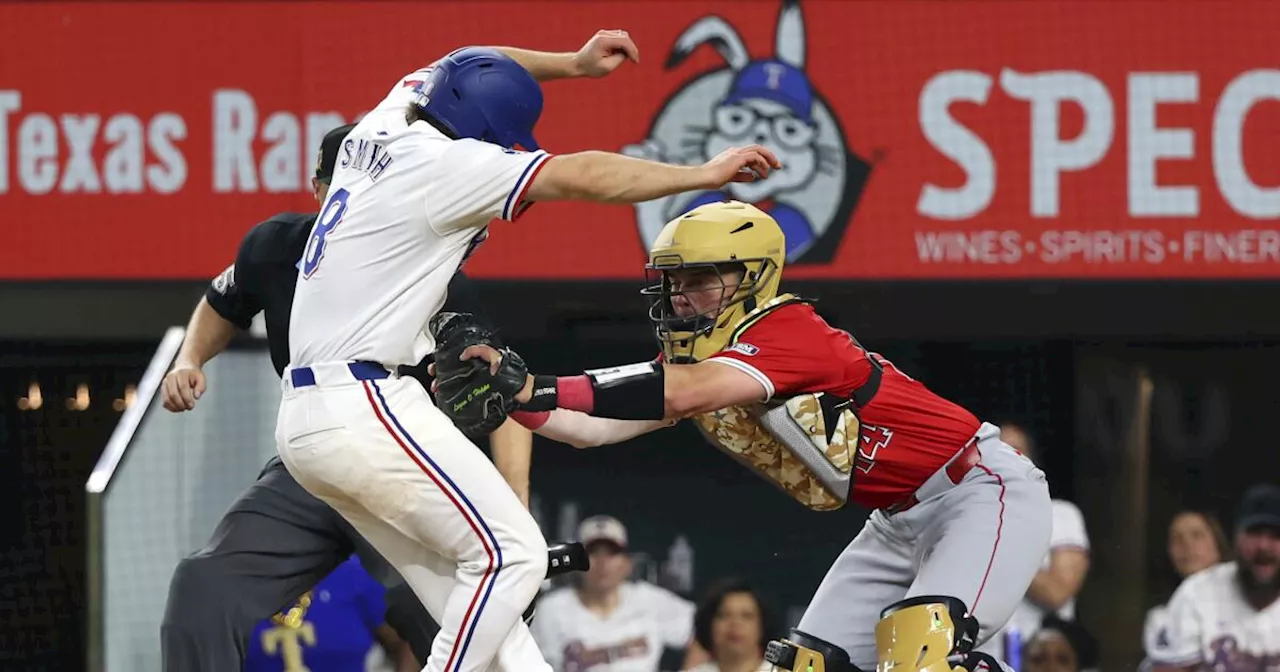 Angels' Carson Fulmer gives up winning run in 13th inning by hitting a Rangers batter