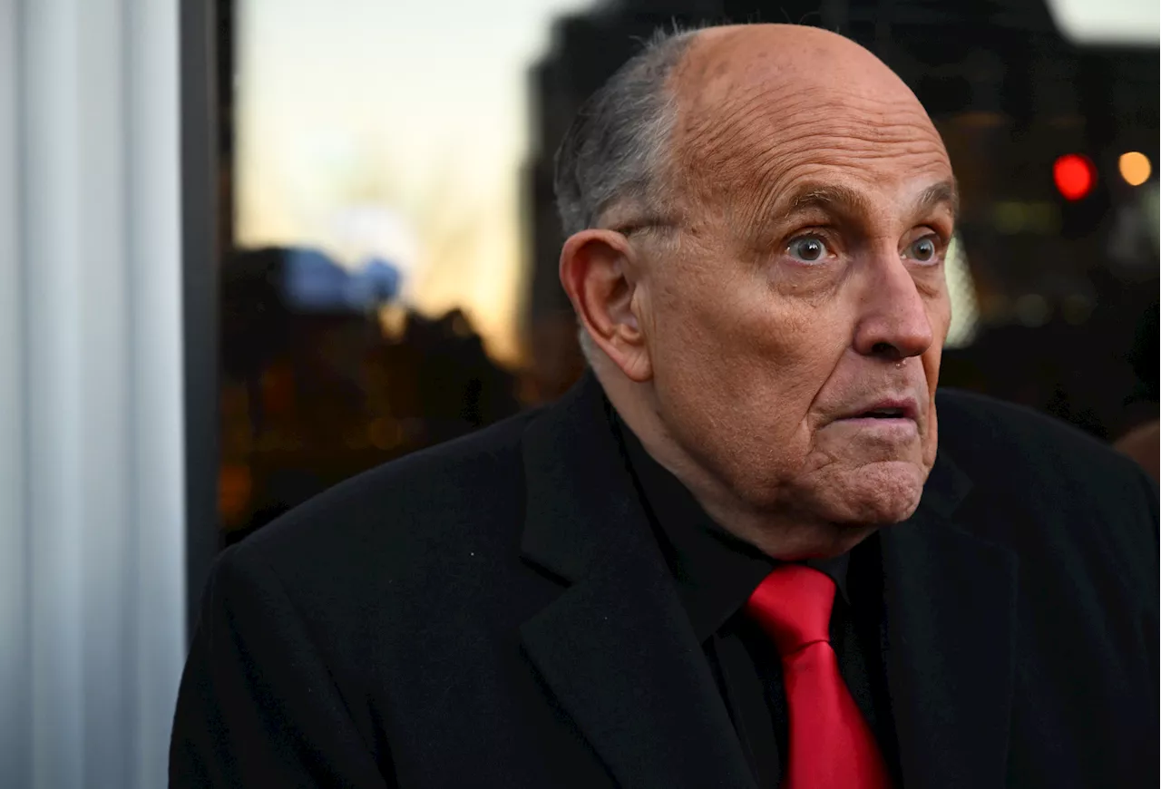 Rudy Giuliani is served indictment papers at his own birthday party after mocking Arizona attorney general