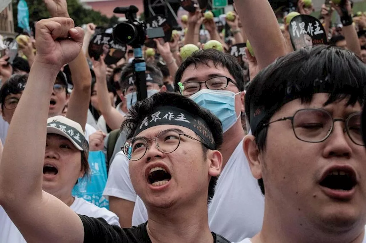 Hundreds protest Taiwan’s ruling party on eve of Lai’s inauguration