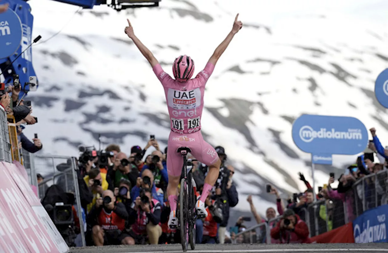 Pogacar soars to landmark Giro win on snow-capped peak