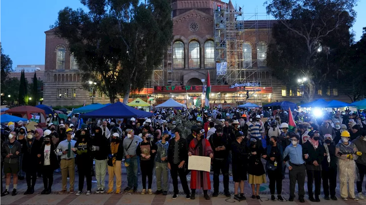 Police begin removing barricades at a pro-Palestinian demonstrators' encampment at UCLA