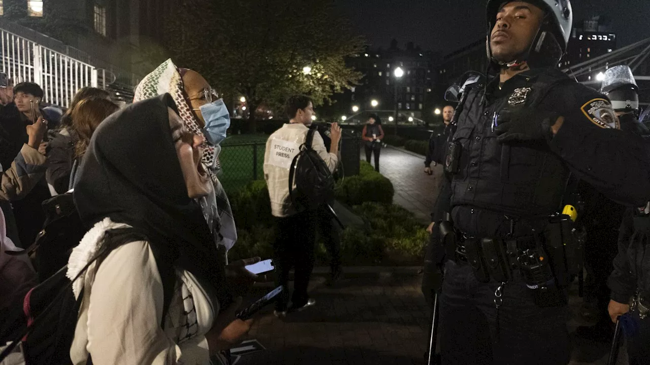 Biden keeps quiet as Gaza protesters and police clash on college campuses