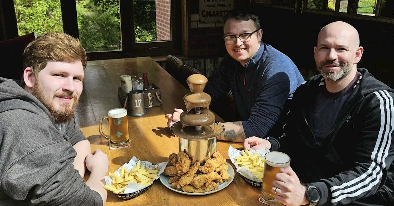 Pub's gravy fountain with mountain of fried chicken goes viral