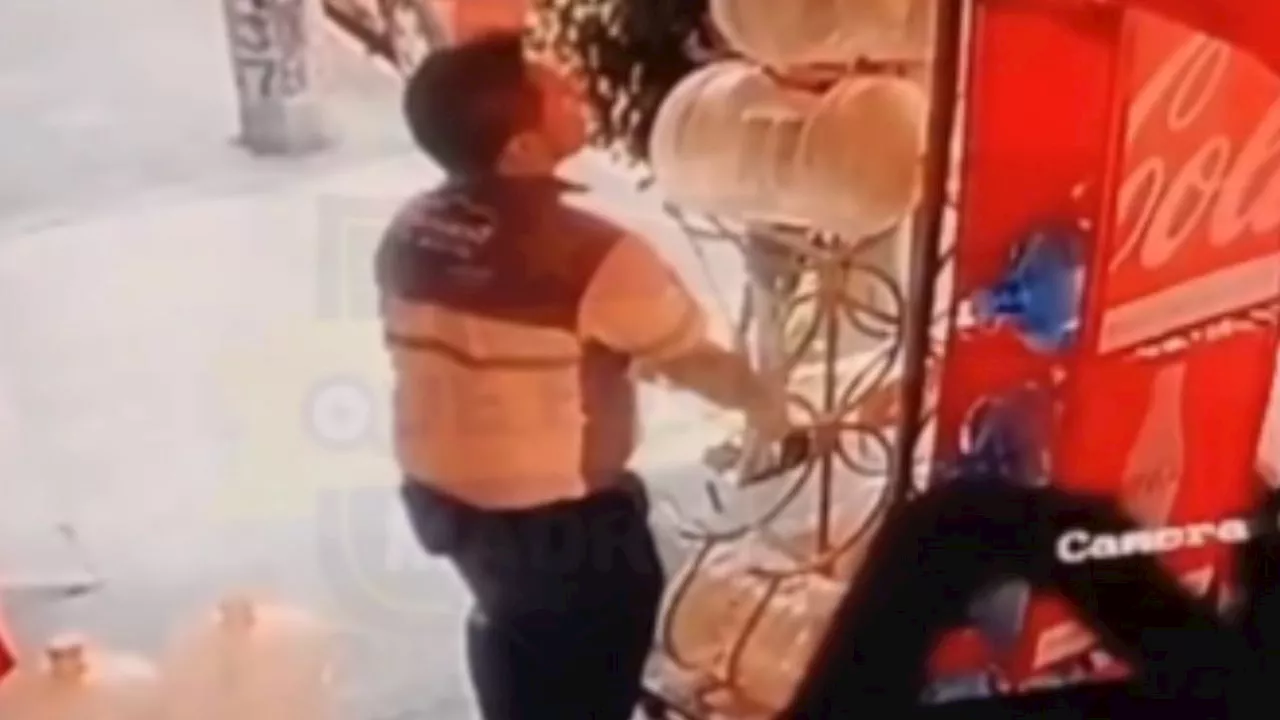 VIDEO: sujeto se hace pasar por trabajador para robar garrafones en Iztapalapa