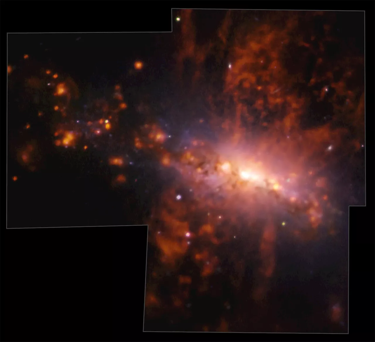 Giant Galactic Explosion Reveals Cosmic Pollution Dynamics