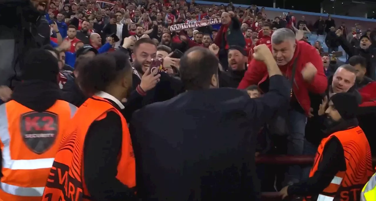 Nottingham Forest owner Evangelos Marinakis seen celebrating with Olympiakos fans at Aston Villa’s ground...