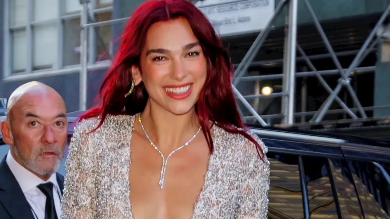 Dua Lipa taps up 80s chart legend for surprise cameo during her Glastonbury headline set...