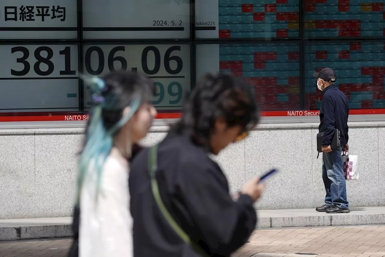 Stock market today: Asian markets wobble after Fed sticks with current interest rates