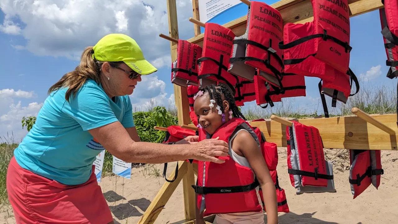 Life jackets on site for Marquette Park swimmers after rack dedication