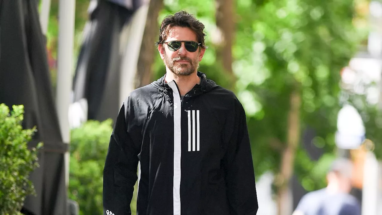 Bradley Cooper makes the RARE move of wearing shorts to display his very toned legs in New York...