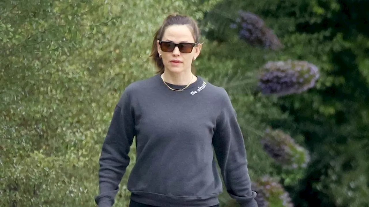 Jennifer Garner opts for sporty look in black leggings during morning stroll in LA... after weekend...