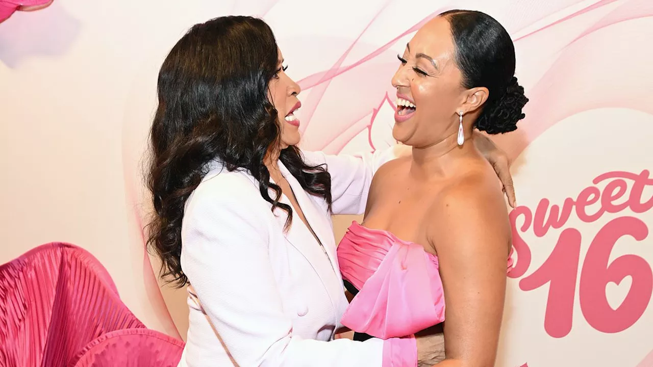 Sister, Sister reunion! Tamera Mowry catches up with her TV mom Jackée Harry at Beverly Hills party...