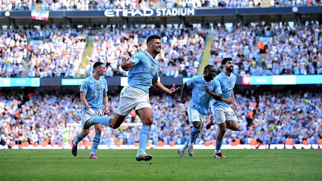 Manchester City win Premier League as jubilant fans storm the pitch