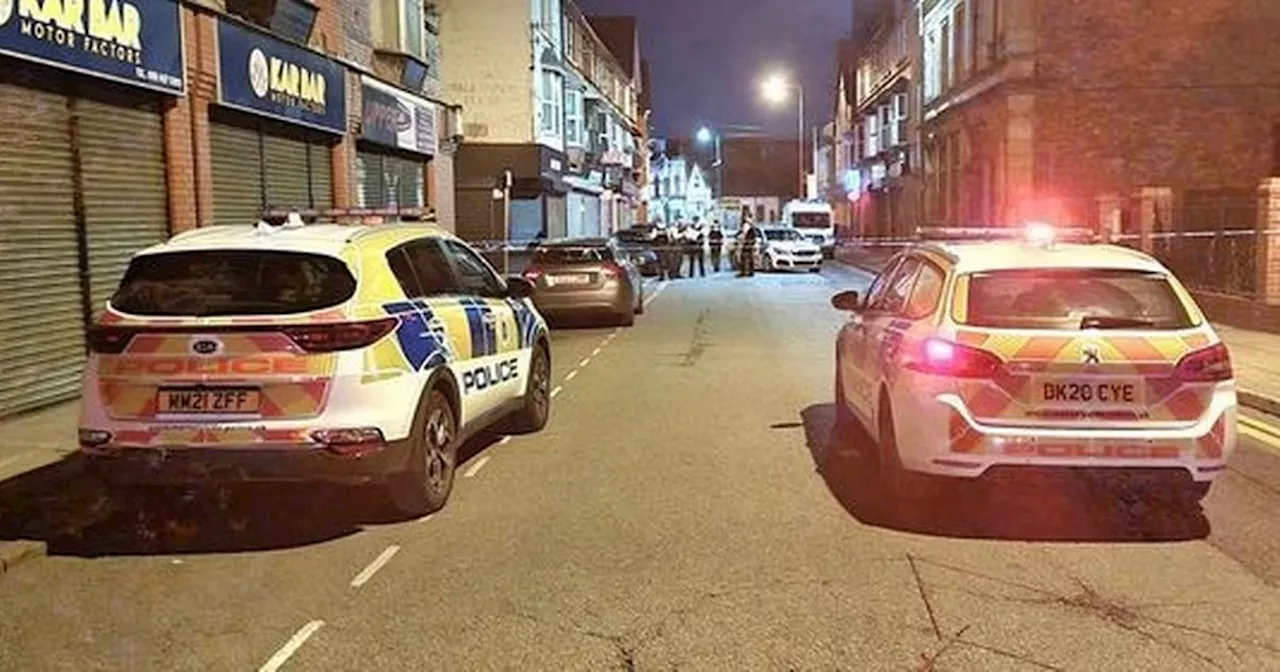 Road cordoned off and police carrying out stop checks