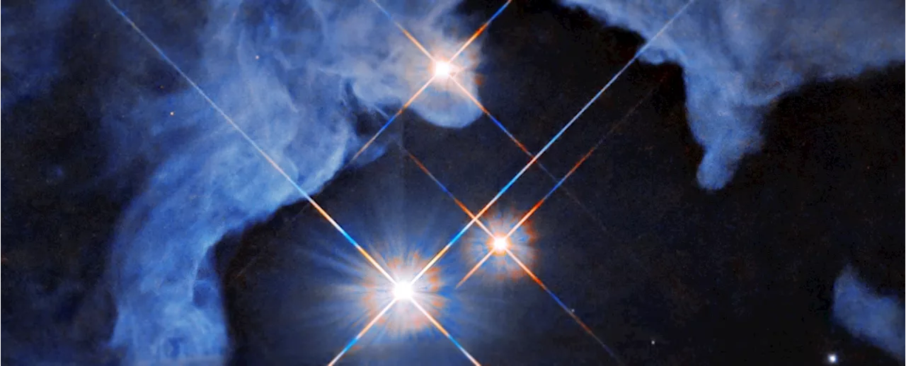 Astronomers Reveal Stunning New Image of Triple-Star System Gleaming in Space