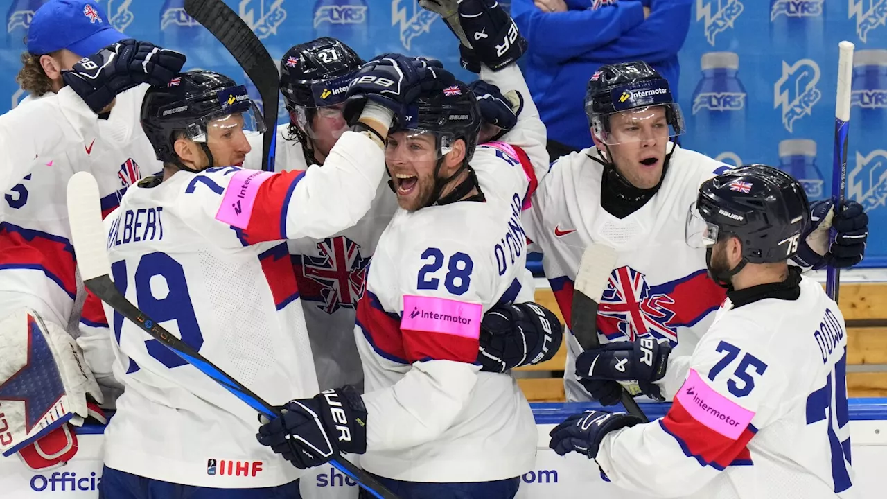 Britain tops Austria 4-2 for 1st win at hockey worlds, Germany beats France 6-3