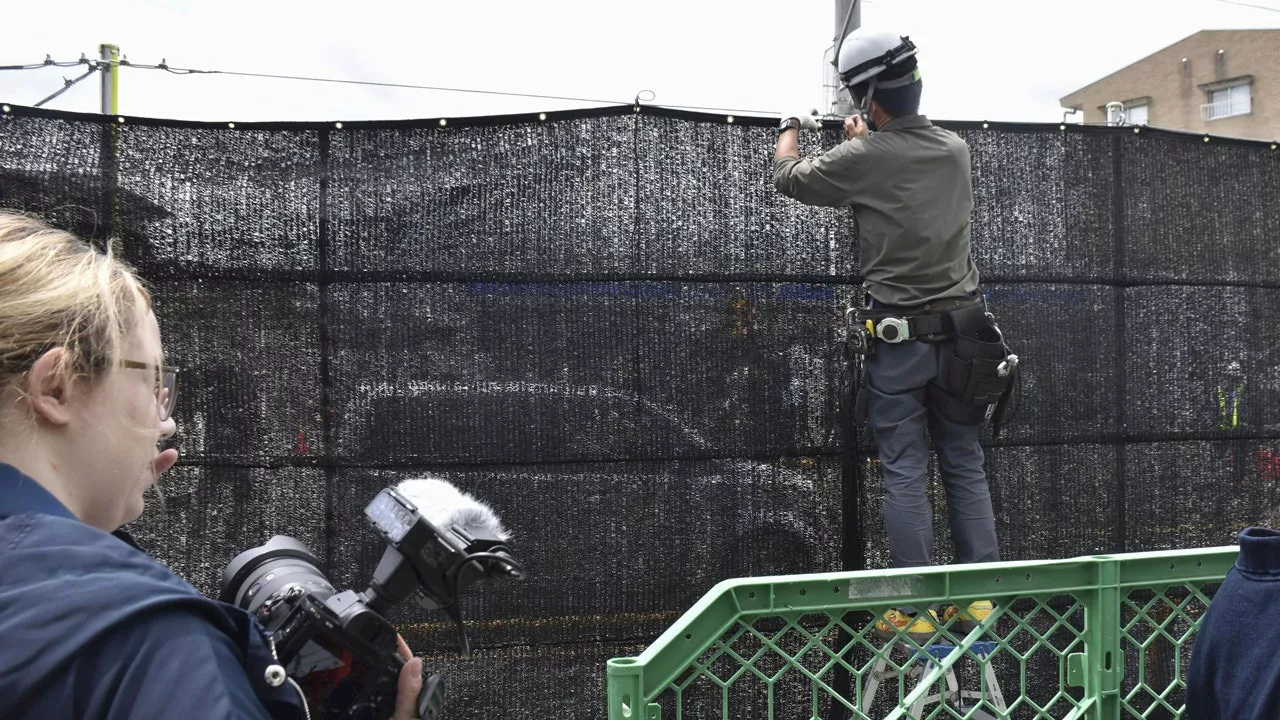 Japanese town erects giant screen in front of Mount Fuji to prevent tourist crowding