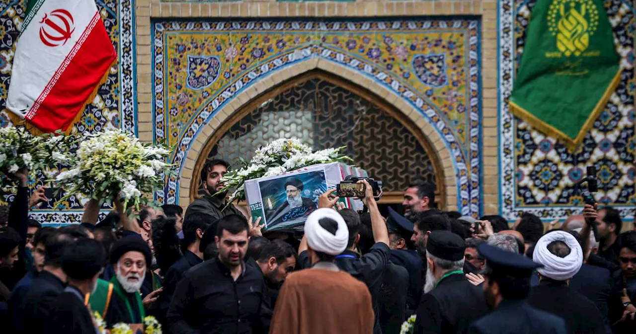 Mourners gather in muted memorial for Iran’s president Ebrahim Raisi