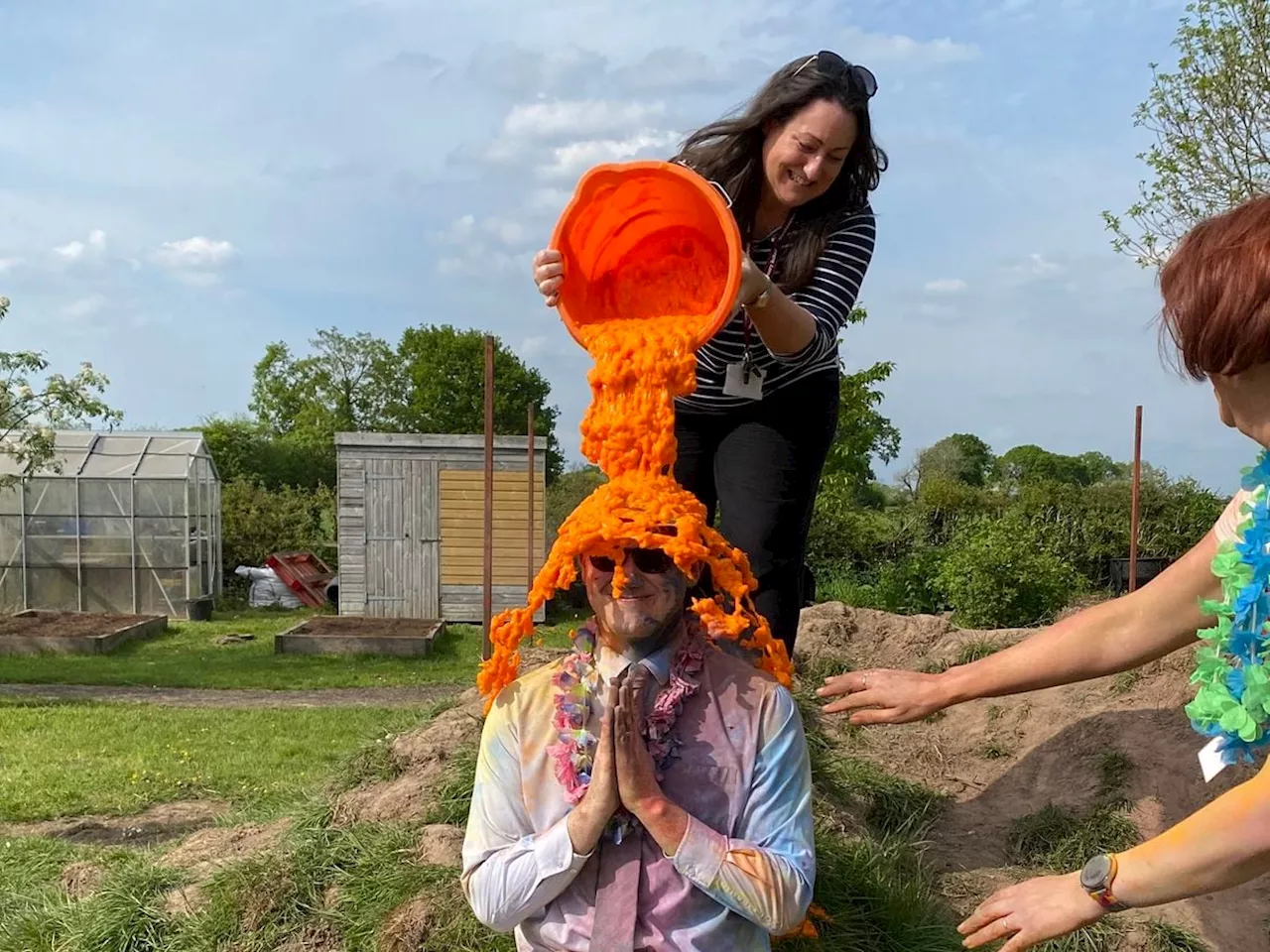 Headteacher gets a good 'gungeing' for a good cause at colourful school event