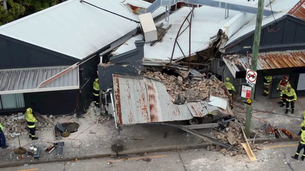 Truck driver freed after slamming into house in Sydney’s south