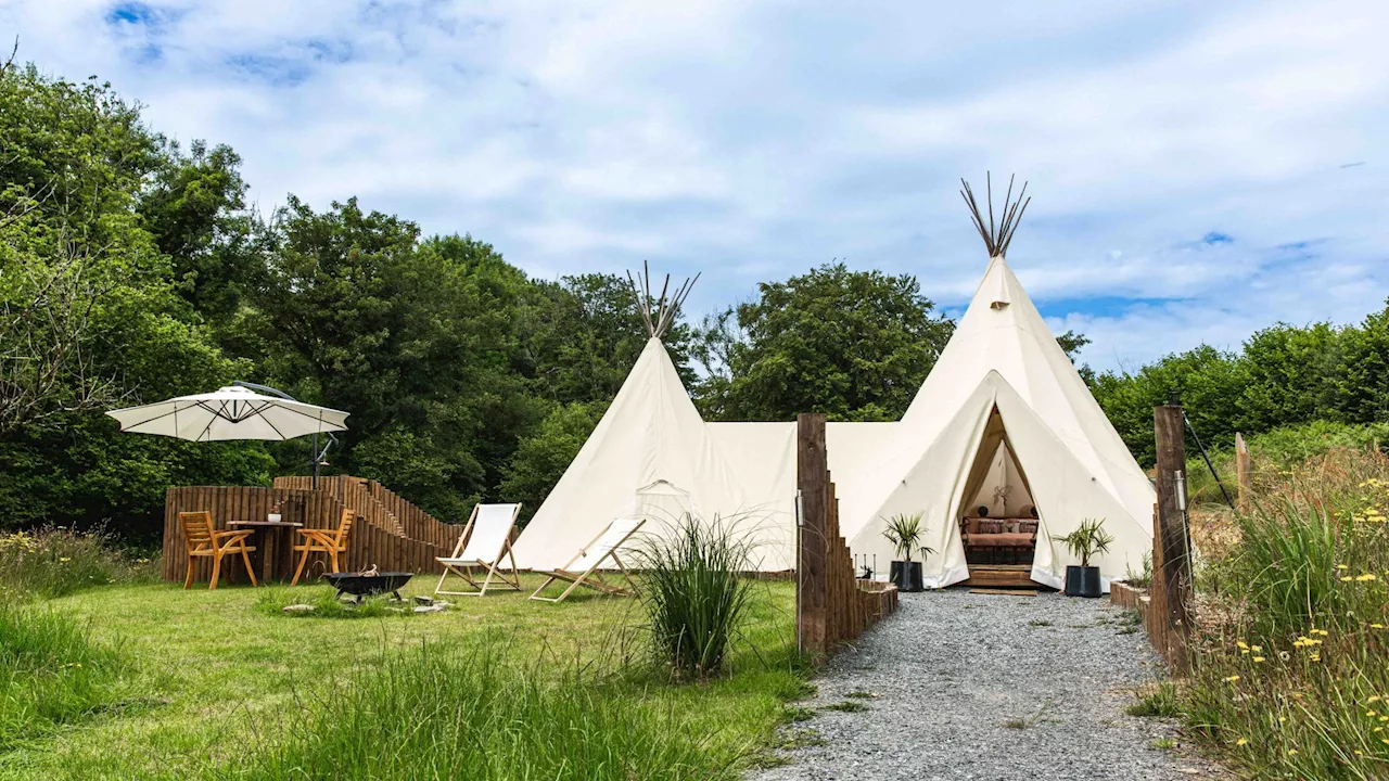 Inside the UK campsite that’s like a boutique hotel – with curries delivered to your bed & tents with und...