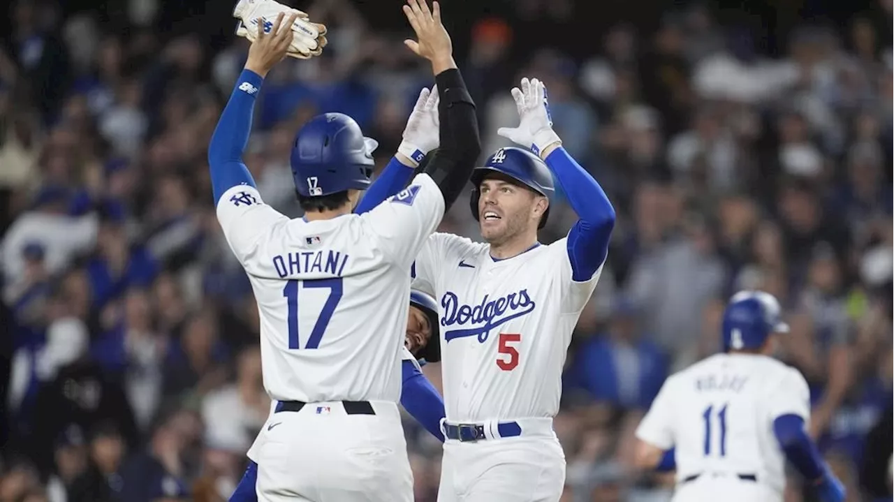 Freeman's grand slam powers Dodgers to victory over Diamondbacks