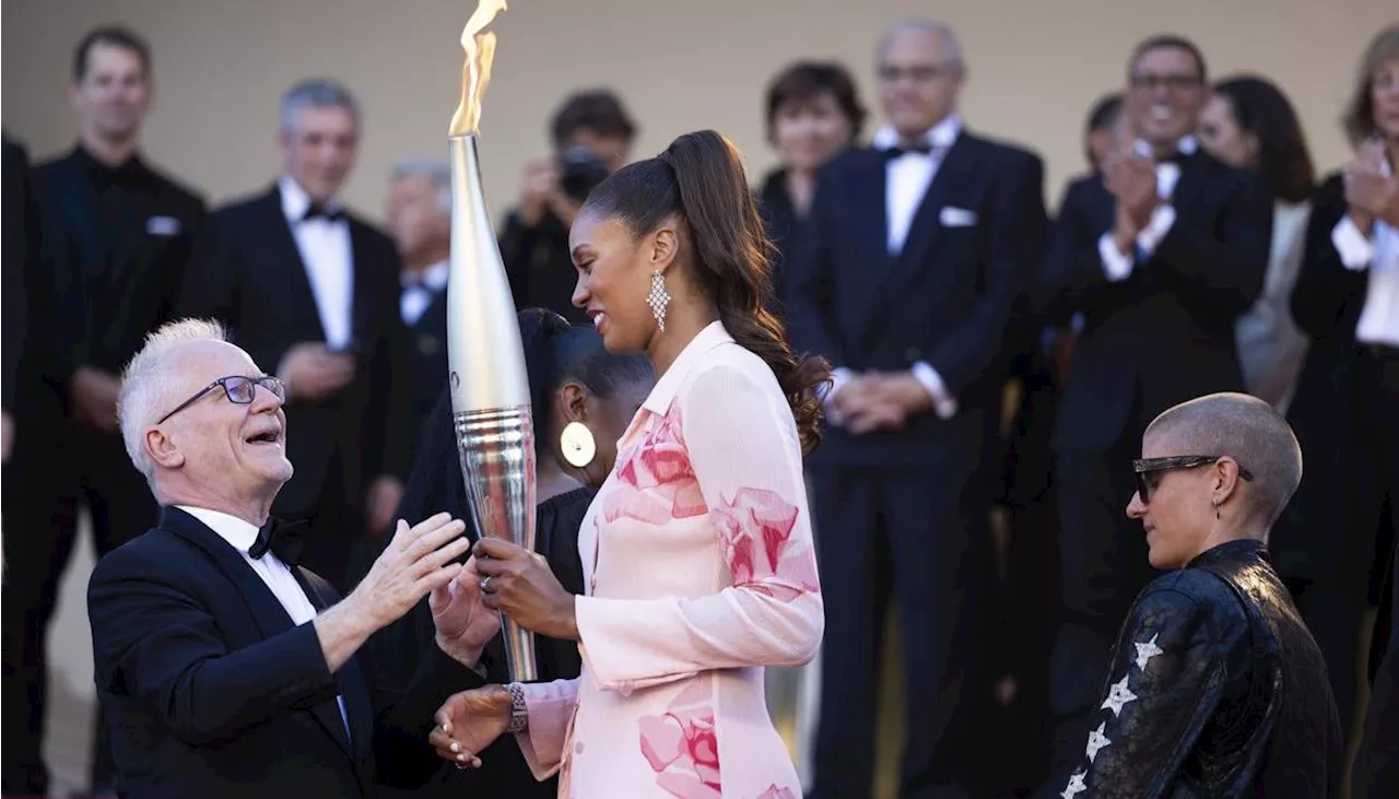 Alfombra roja olímpica en Cannes: la antorcha de París 2024 ilumina el Festival