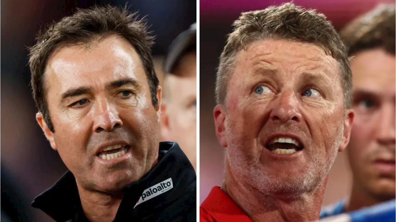 AFL coaches Brad Scott and Damien Hardwick fire up