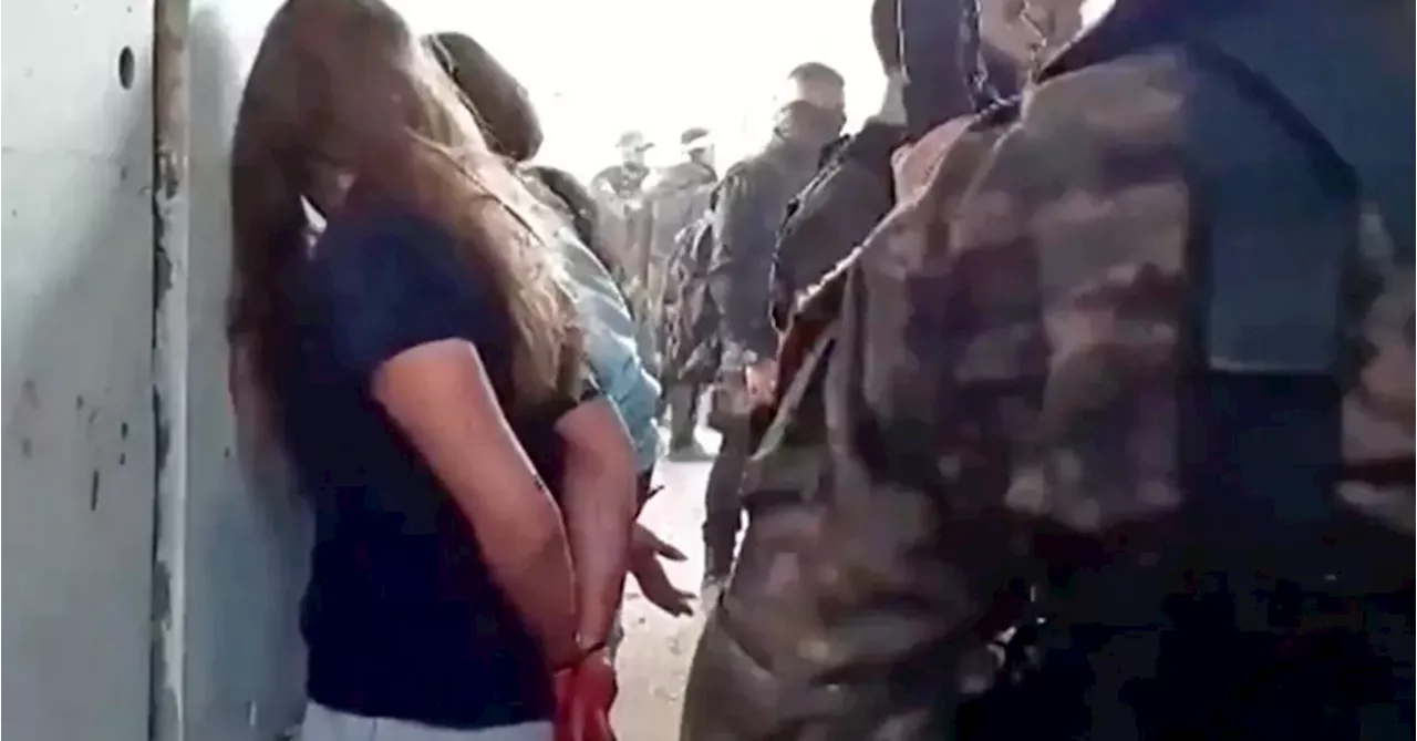 Families of Israeli hostages release video of female soldiers being captured by Hamas