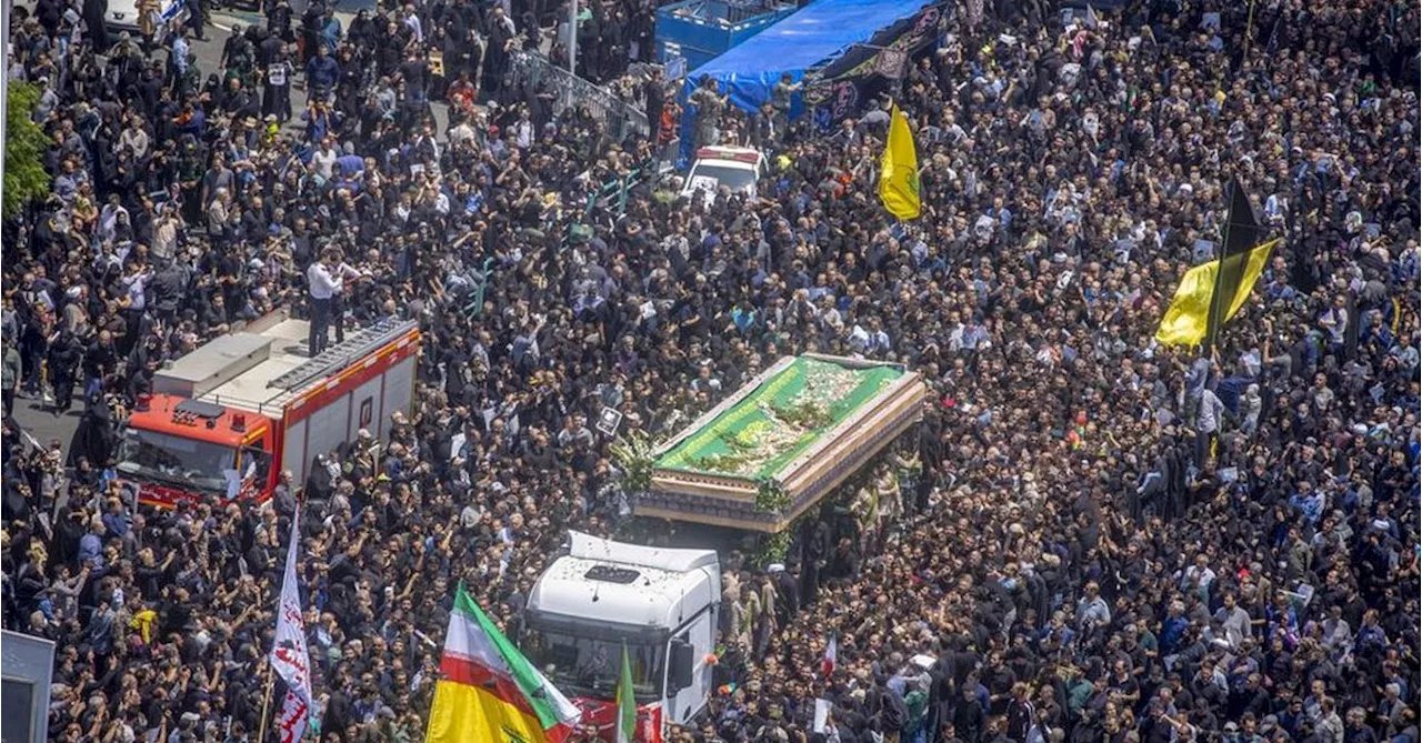 Massive crowds gather in Tehran for Iranian president's funeral procession