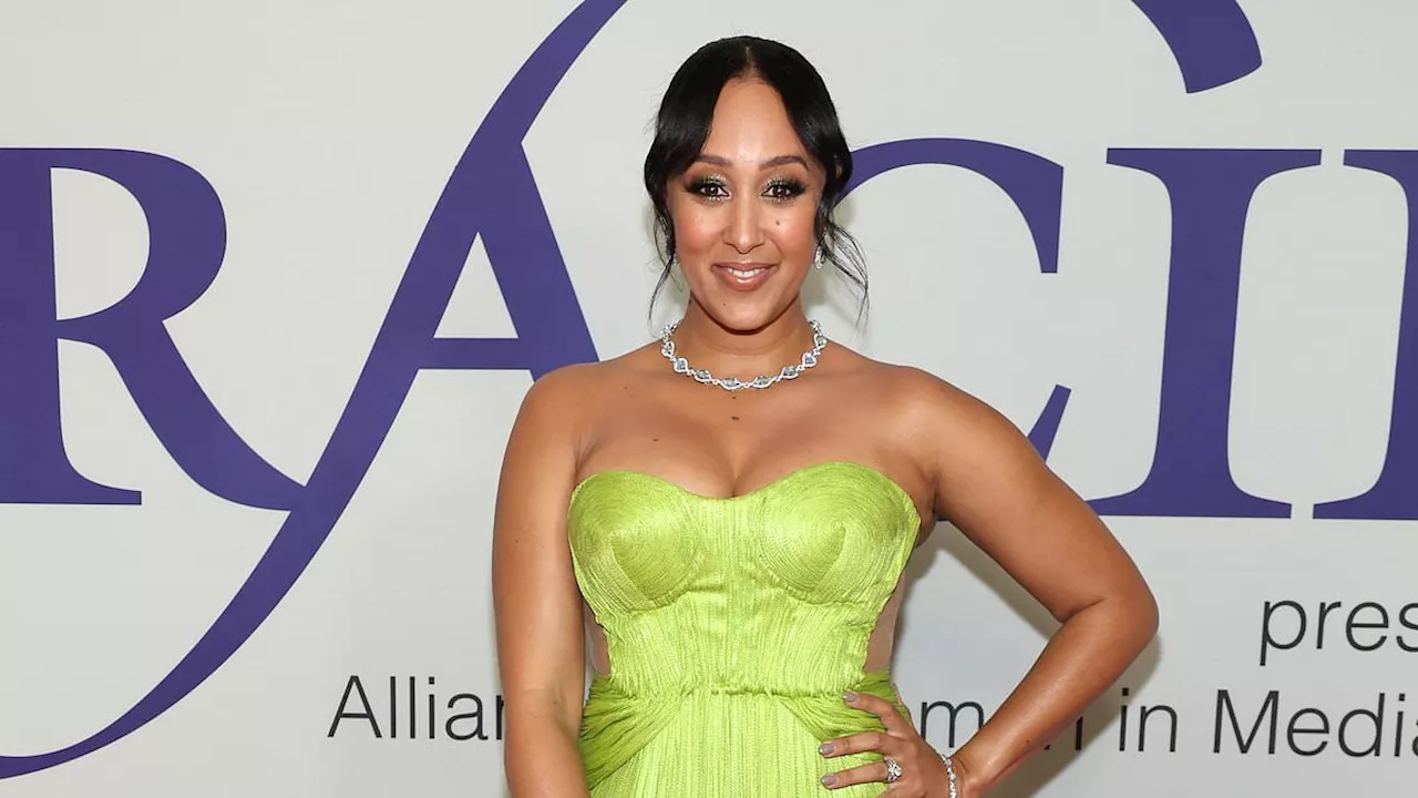 Tamera Mowry glams up in strapless green-pleated gown to host the Gracie Awards in Beverly Hills