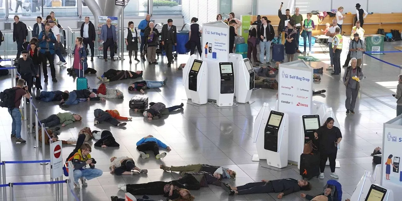 „Leichenschau“ der Klima-Kleber am Flughafen - Passagiere rufen „Geht arbeiten“