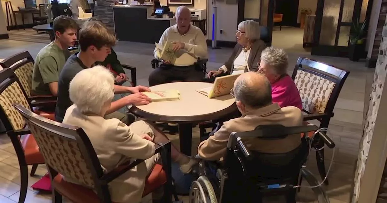 Senior citizens, high school seniors bond over yearbooks, memories from 1940s