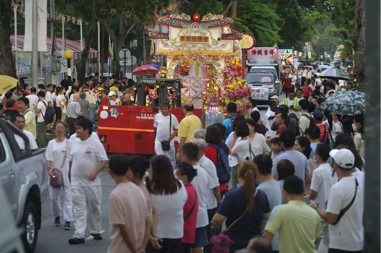 Colourful floats and bright lights illuminate George Town for Wesak Day