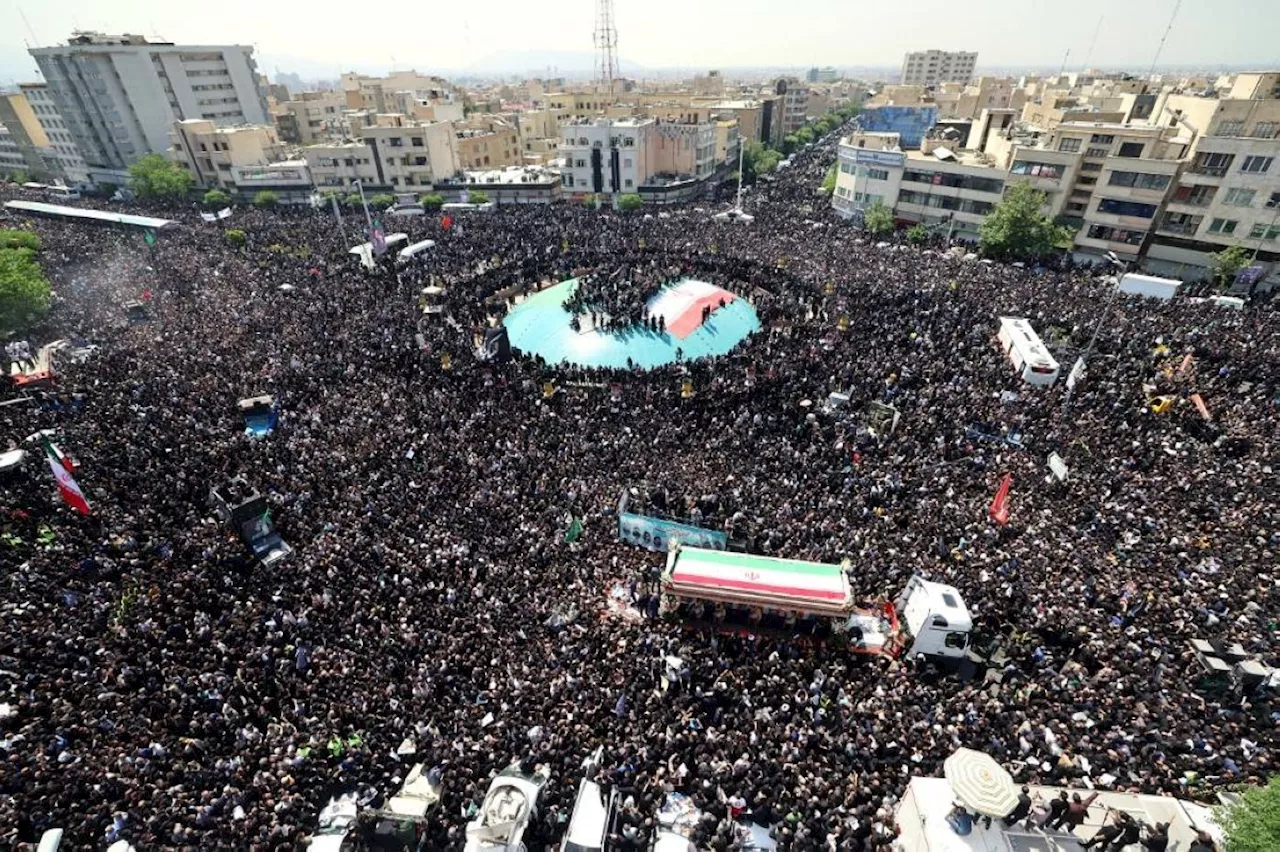 Huge crowds in Iran's capital for president's funeral