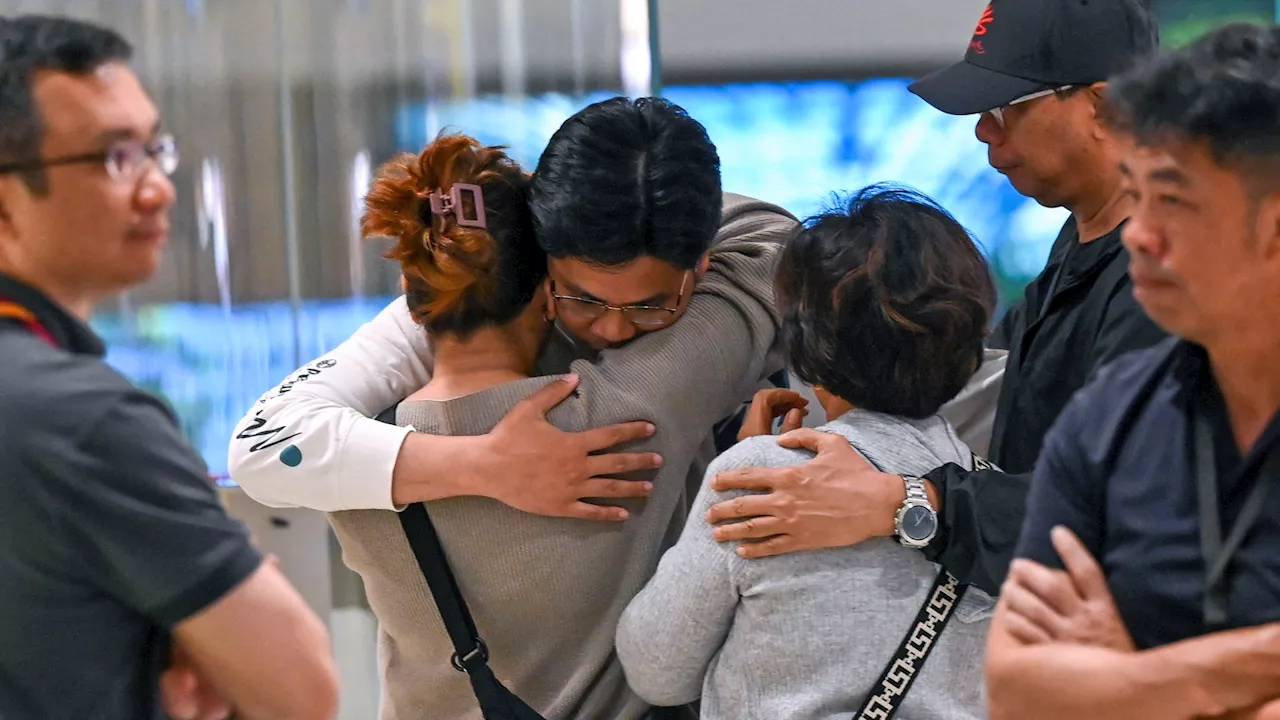 Passengers ‘did somersaults’ in 7,000ft drop that killed granddad, 73, as Singapore flight survivors greet...