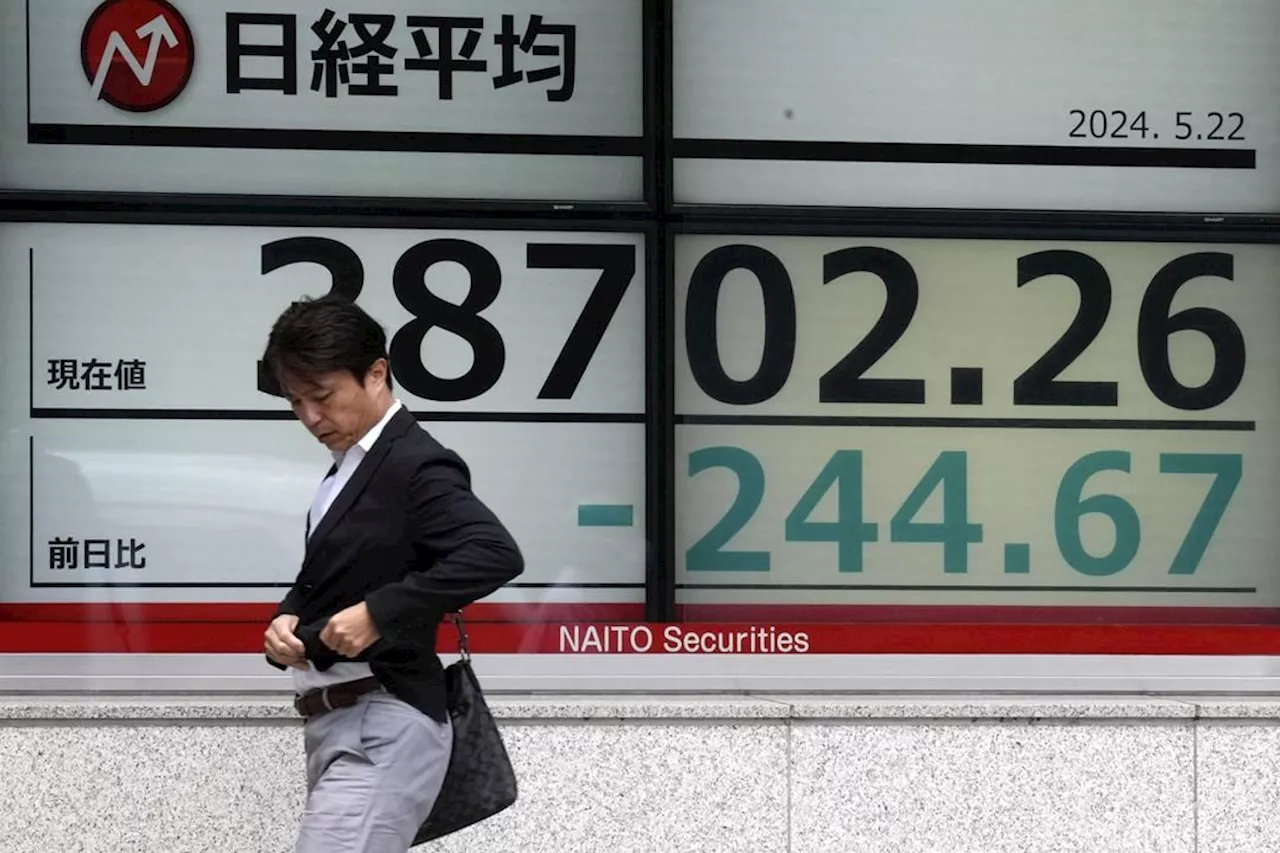 Stock market today: Asian shares edge lower after Wall Street sets more records